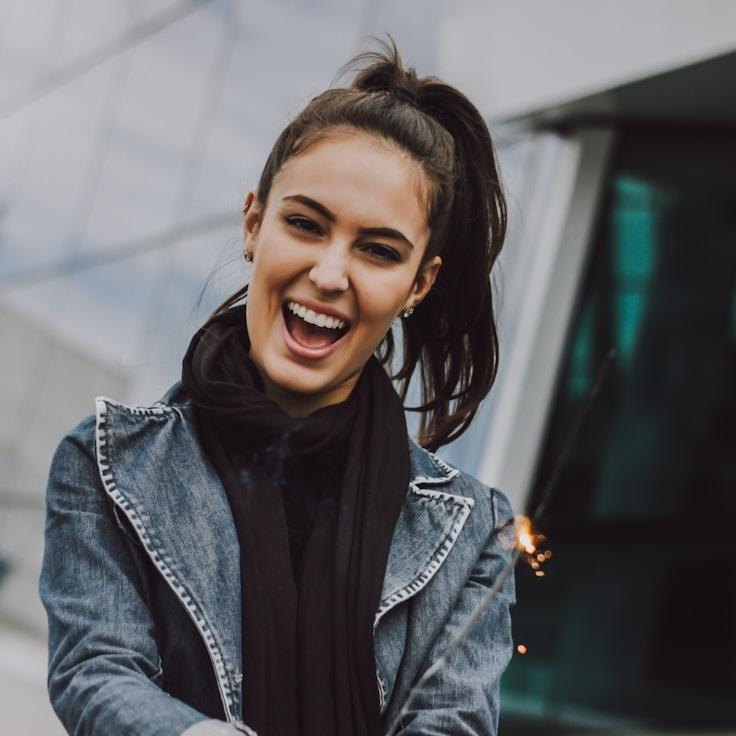 Kaveri Mehta, Lead Design Curator at FreshBridgeCraft, reviewing corporate floral arrangements